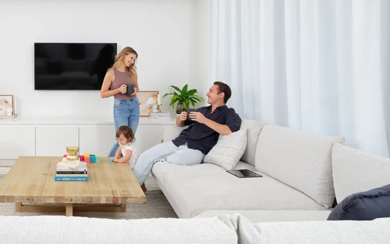 Family relaxing in a bright living room