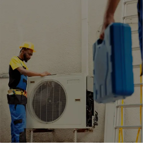 GSA installer fitting an air-conditioning outdoor unit